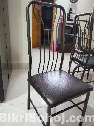 Glass Dining Table with six chairs.